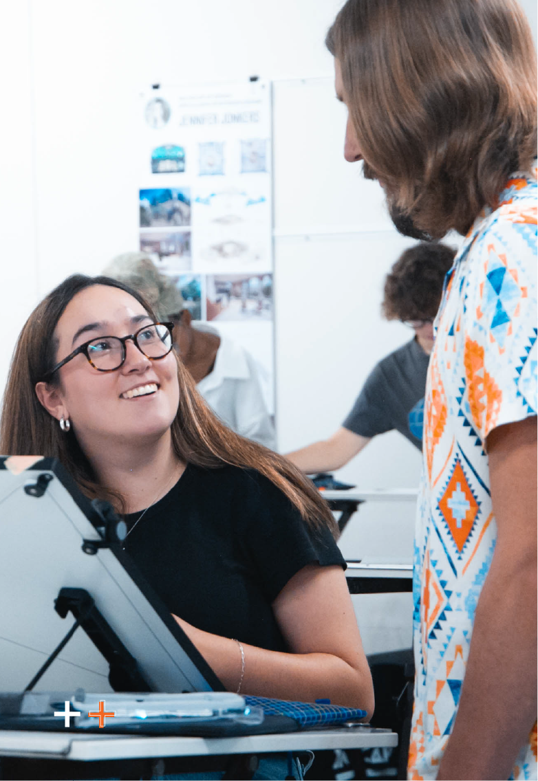 Lady sat at a computer desk